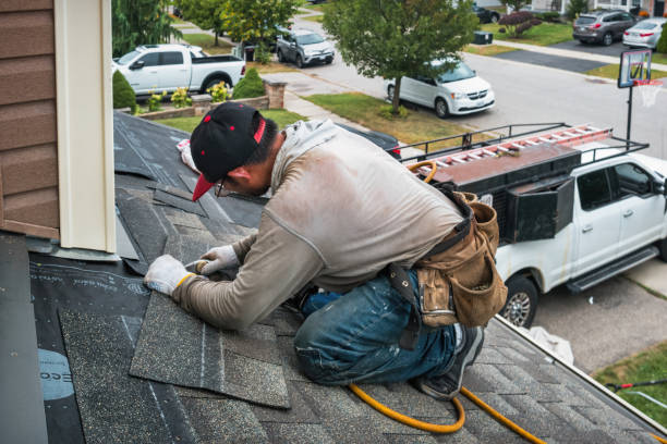 Professional Flat Roof Repair technician working in Cumberland, WI
